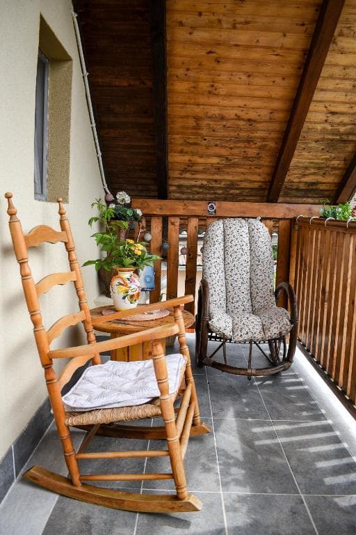 Entry area with balcony access in Apartment 1