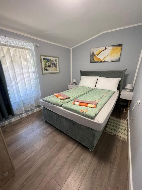 Main bedroom with elegant design in Apartment 2